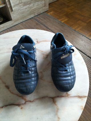 Botas niño futbol tacos