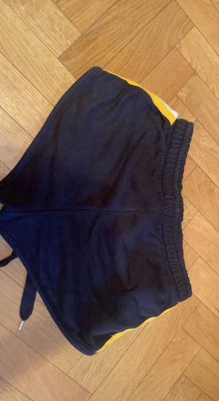 Shorts chándal negros con rayas laterales