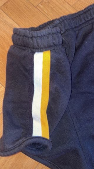 Shorts chándal negros con rayas laterales