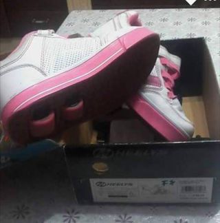 Scarpe con rotelle 34