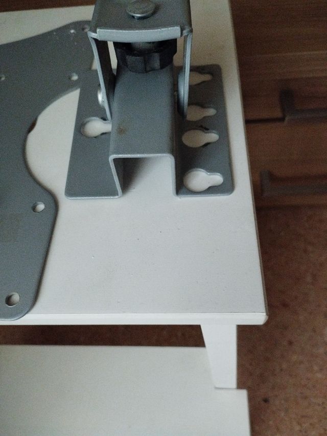 Adaptador de televisión a la pared