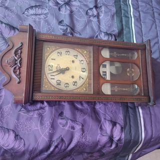 Reloj madera cuerda