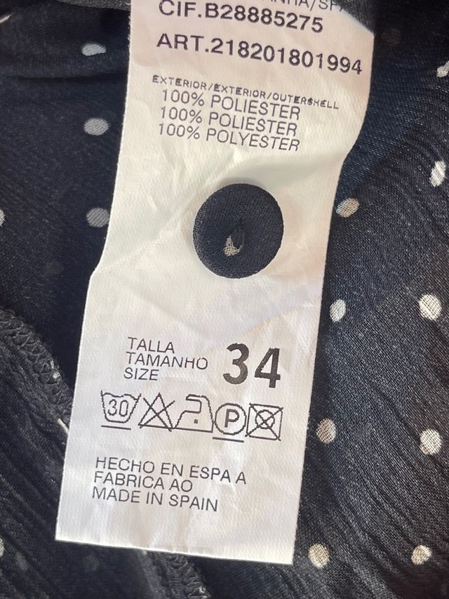 Blusa semitransprente, manga corta, lazada cuello