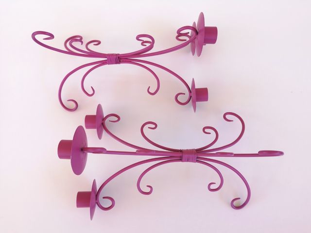 2 candelabros rosa
