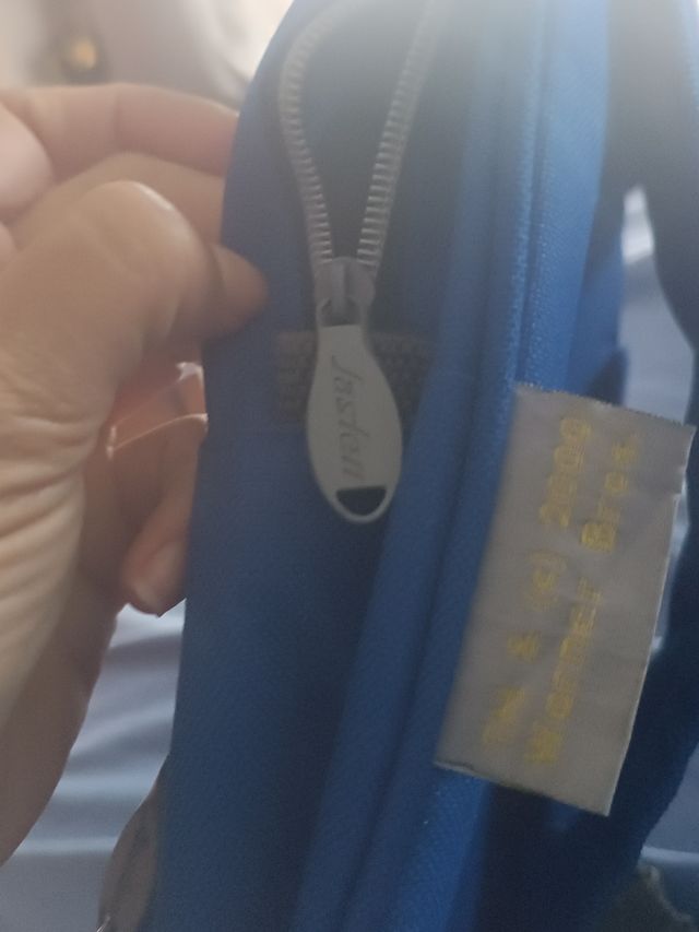 Mochila azul  dibujo piolin y colgante