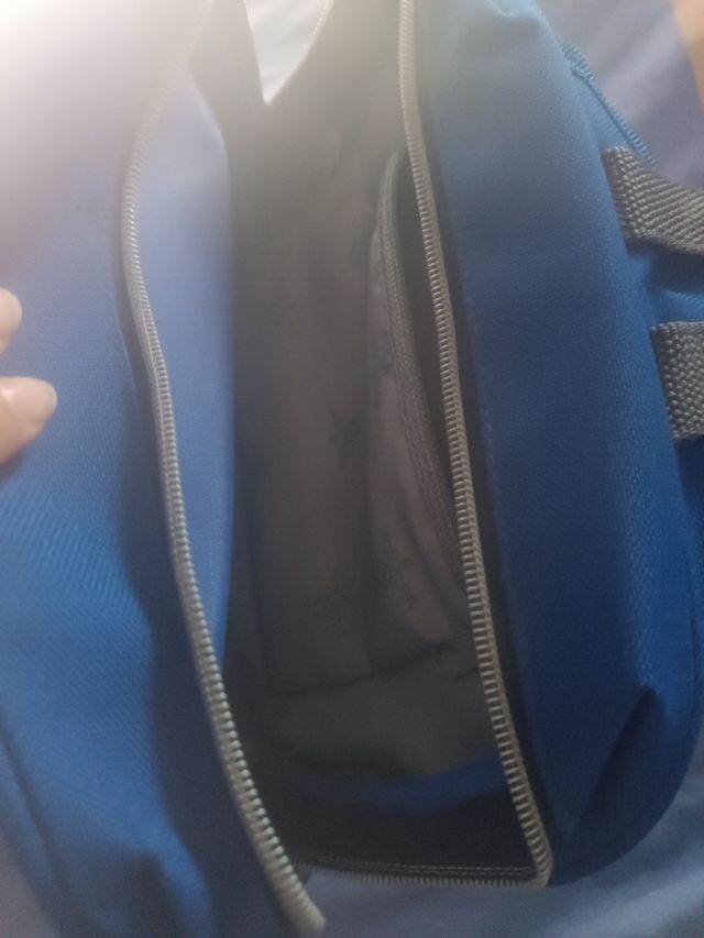 Mochila azul  dibujo piolin y colgante