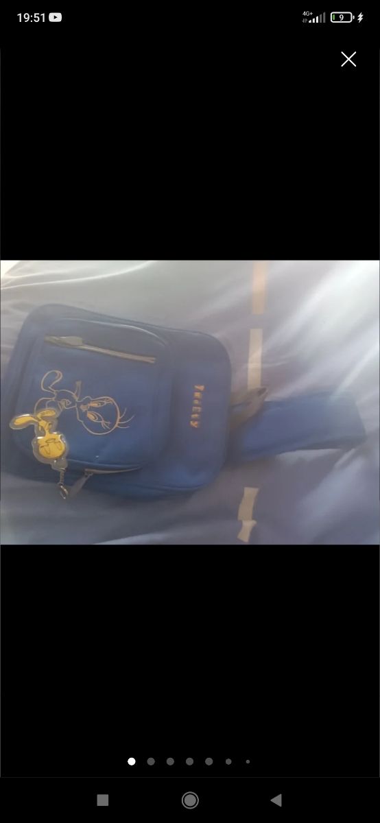 Mochila azul  dibujo piolin y colgante
