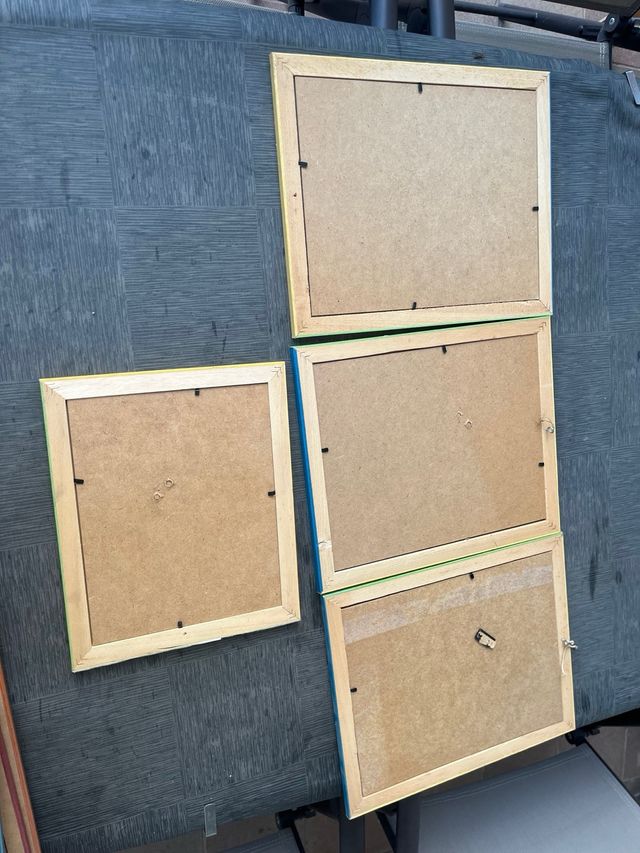 Set di cornici in legno di vari colori