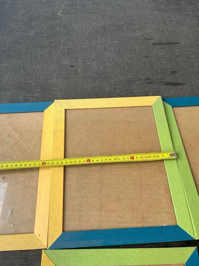 Set di cornici in legno di vari colori