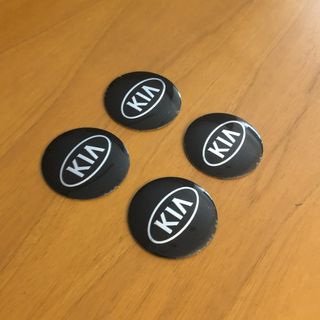 4 lenti adesive coprimozzo Kia 56mm nero