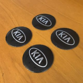 4 lenti adesive coprimozzo Kia 56mm nero