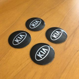 4 lenti adesive coprimozzo Kia 56mm nero