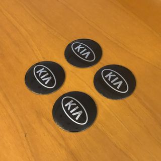 4 lenti adesive coprimozzo Kia 56mm nero