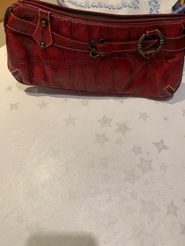 Cartera de mano en piel