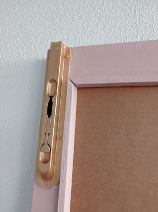 Puerta reciclada y convertida en espejo 