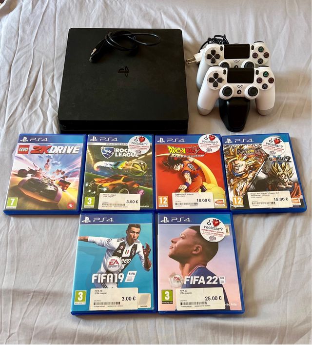 PS4 con 2 mandos y 6 juegos