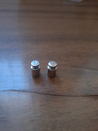 2 pesas de 2 gramos