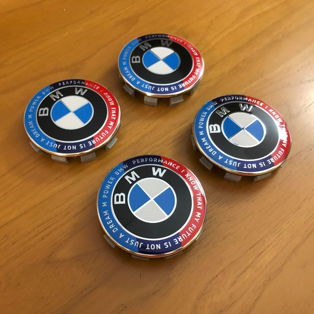 4 tappi coprimozzo Bmw 68mm Ed. Anniversario motto