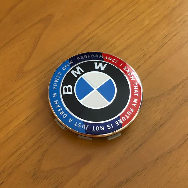 4 tappi coprimozzo Bmw 68mm Ed. Anniversario motto