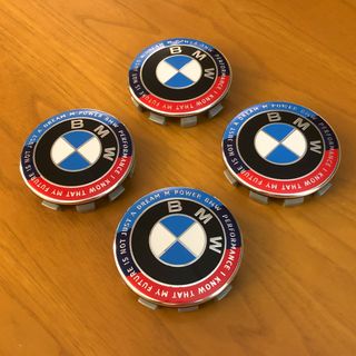 4 tappi coprimozzo Bmw 68mm Ed. Anniversario motto