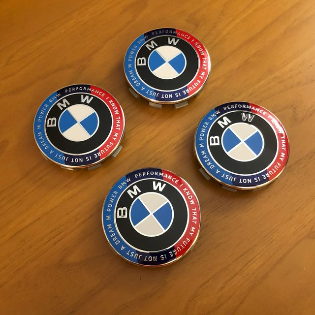 4 tappi coprimozzo Bmw 68mm Ed. Anniversario motto