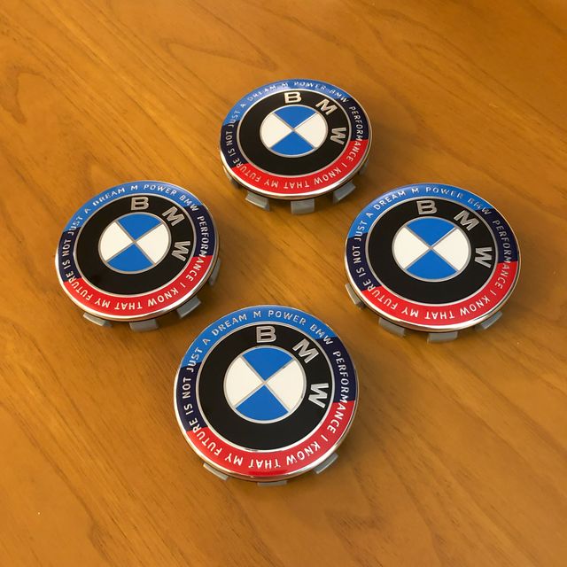 4 tappi coprimozzo Bmw 68mm Ed. Anniversario motto