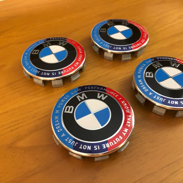 4 tappi coprimozzo Bmw 68mm Ed. Anniversario motto
