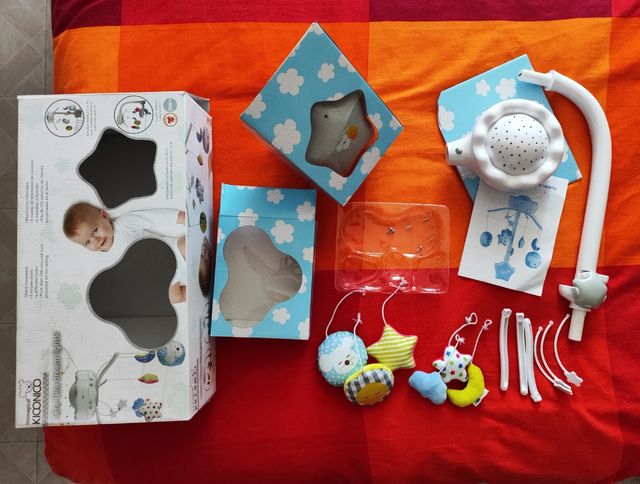 Móvil de cuna con luz, proyector y música