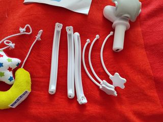 Móvil de cuna con luz, proyector y música