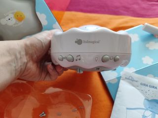 Móvil de cuna con luz, proyector y música