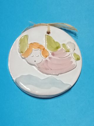 Maiolica tonda con angelo rosa