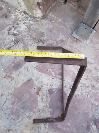 Pieza triangular para barbacoa
