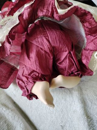 Bambola in porcellana da collezione