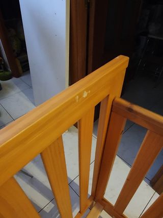 Cuna de madera.