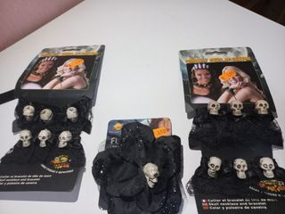 Flor negra con calaveras collar ypulsera