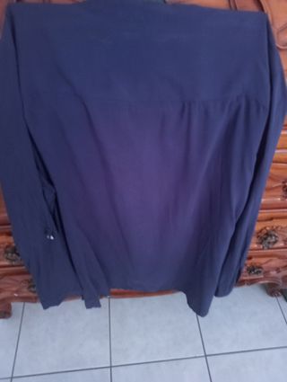 Camicia blu,con bottoni gioiello.