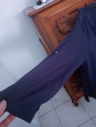 Camicia blu,con bottoni gioiello.