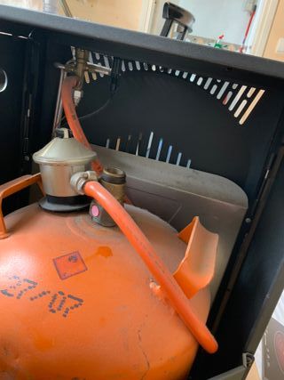 Estufa a butano(garrafa incluida)como nueva!