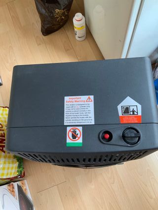 Estufa a butano(garrafa incluida)como nueva!