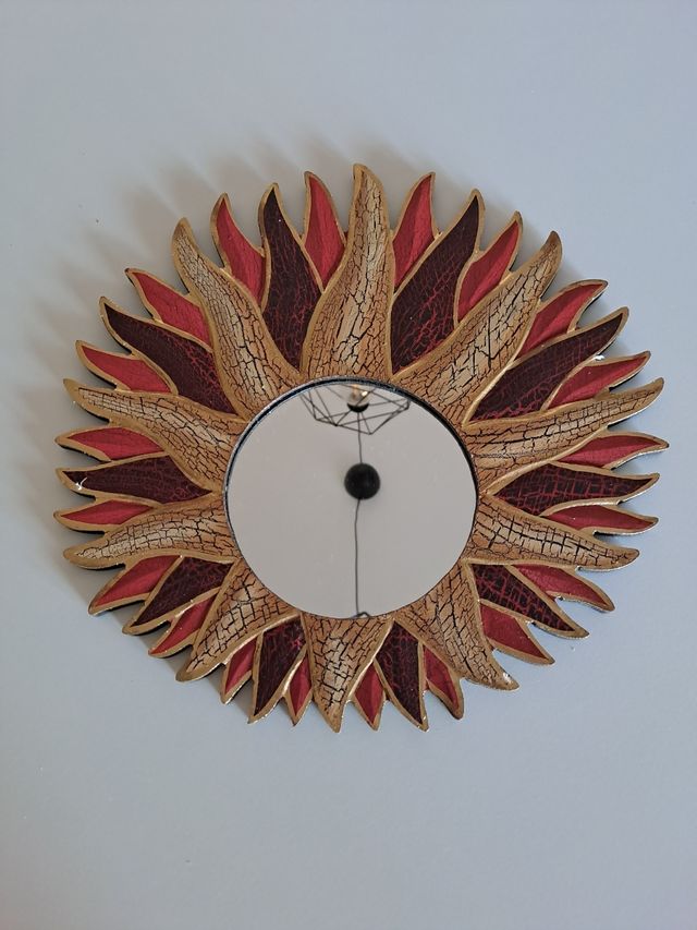 Specchio etnico a forma di sole