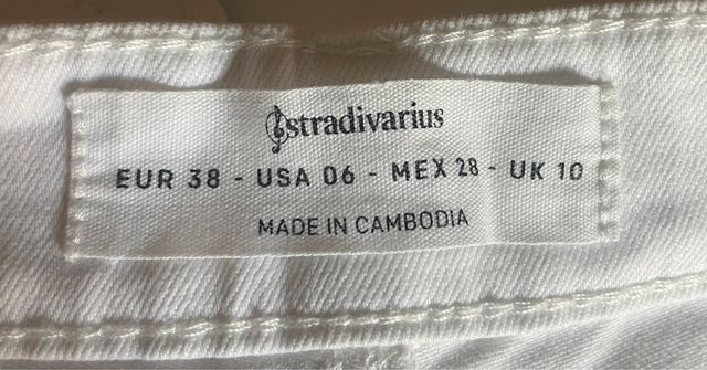 White slightly flare denim pants