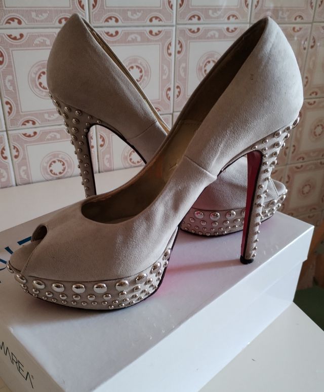 Scarpe con tacco alto