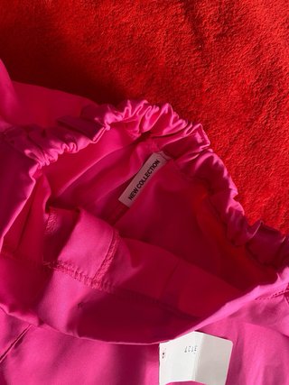 pantalon corto voleado rosa