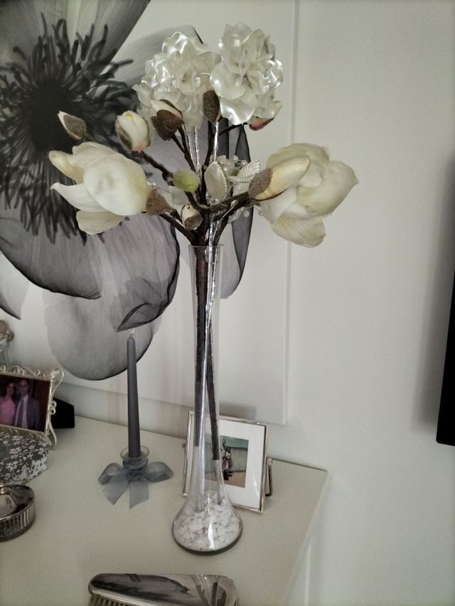 Jarrón de cristal con flores