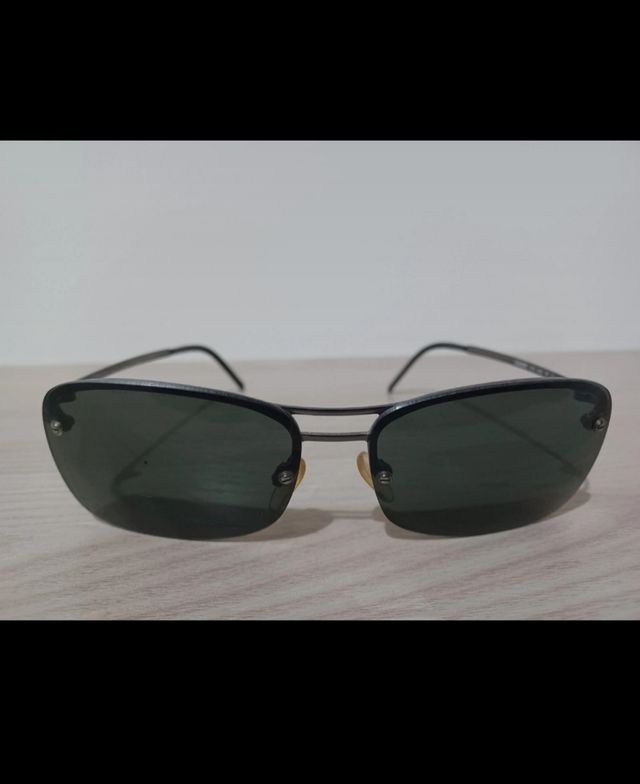 Occhiali da sole neri vintage Benetton