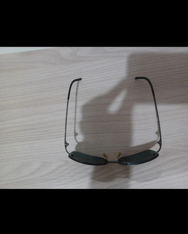 Occhiali da sole neri vintage Benetton