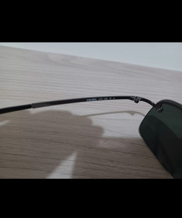 Occhiali da sole neri vintage Benetton