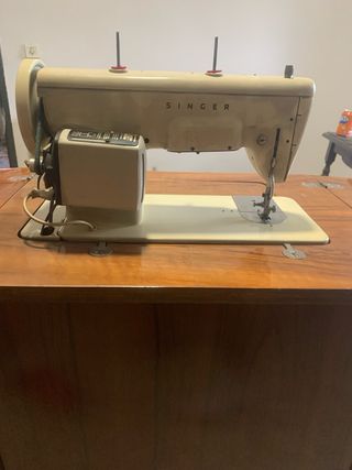 Maquina de coser Singer antigua con mueble