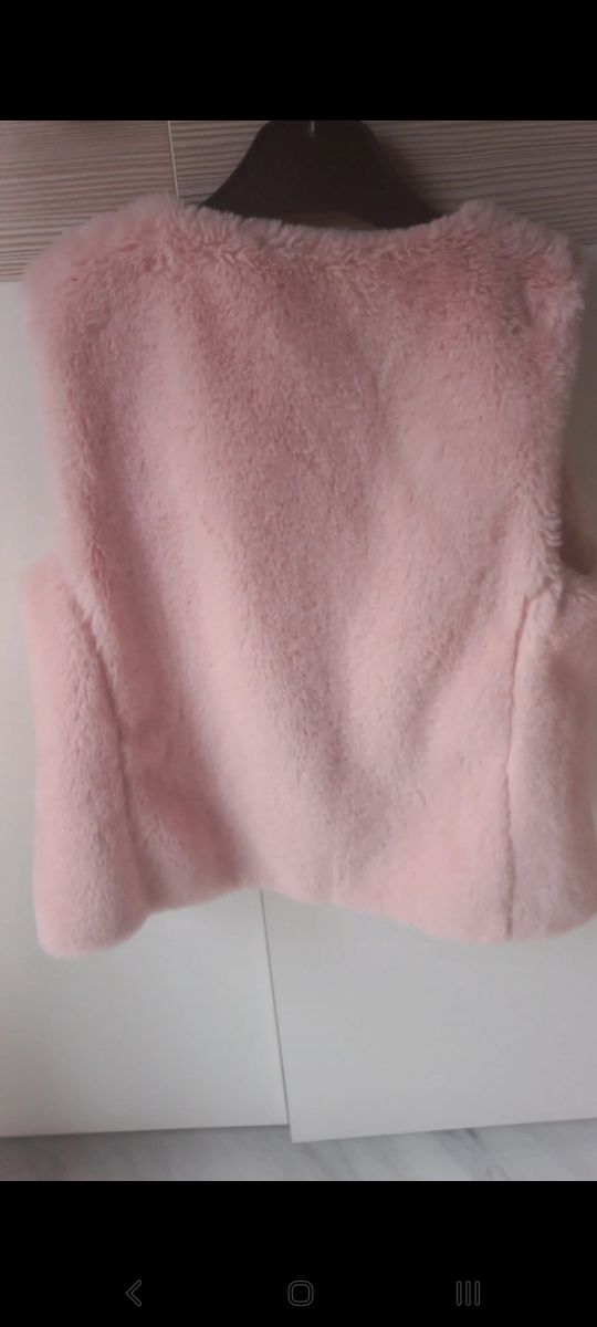 Chaleco de niña rosa pastel