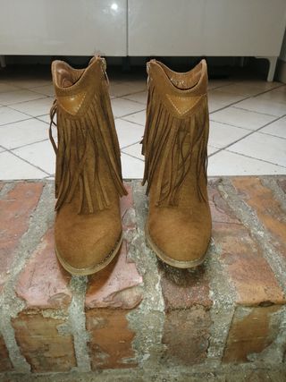 Texani estivi scamosciati con le frange